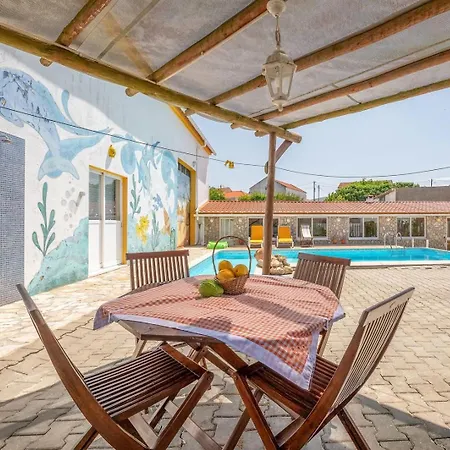 Eclectic Oasis With Poolside Charm In Ferienhaus Arranho