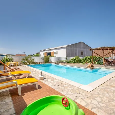 Ferienhaus Eclectic Oasis With Poolside Charm In