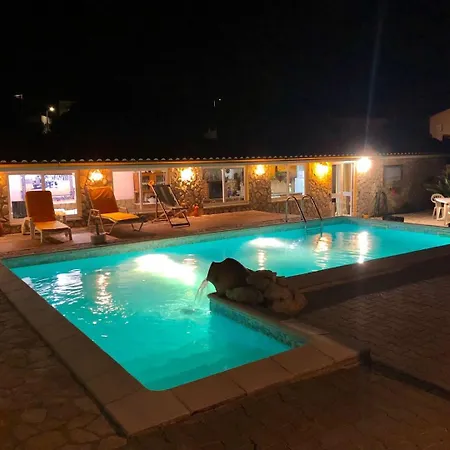 Ferienhaus Eclectic Oasis With Poolside Charm In